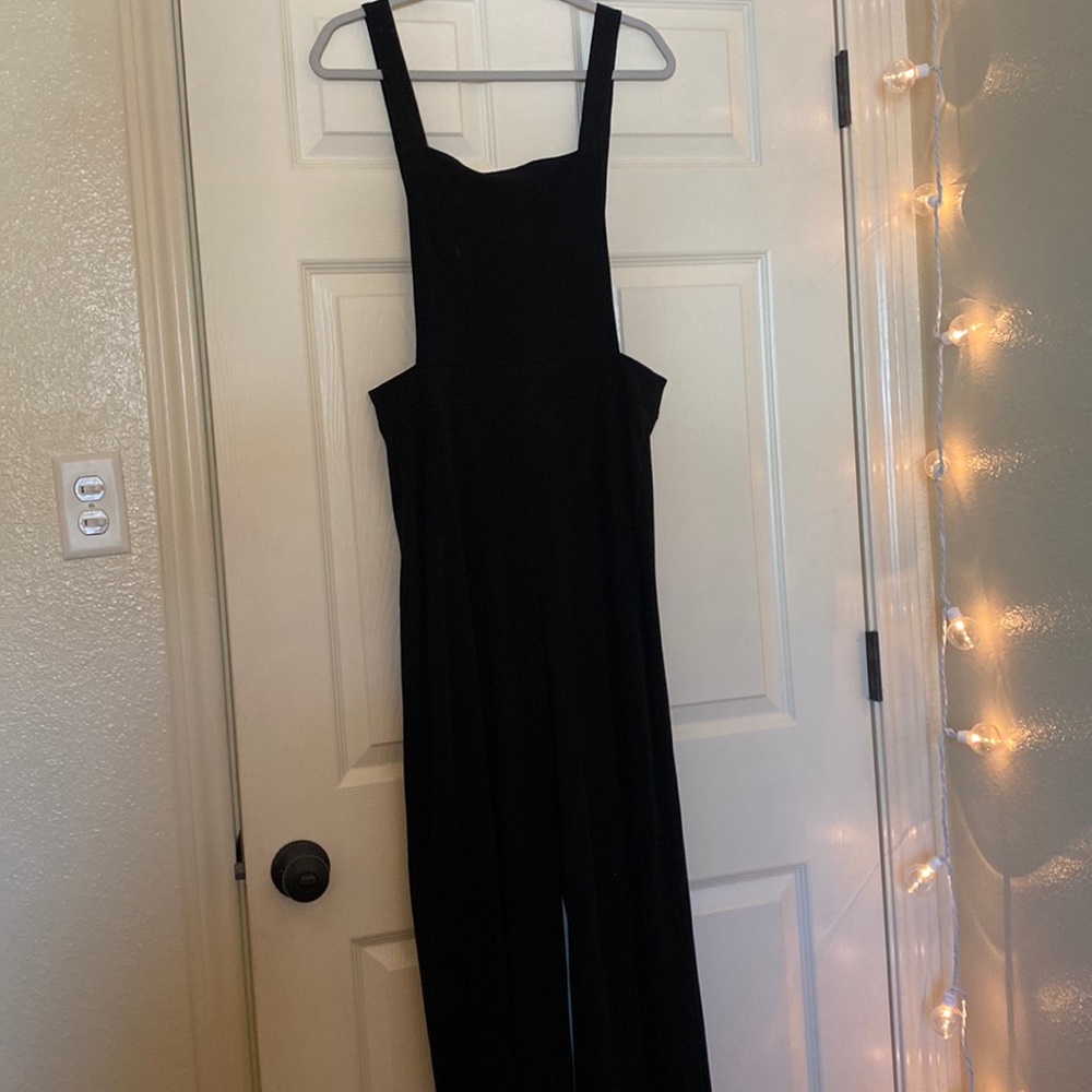 Women’s black corduroy overalls. Size L